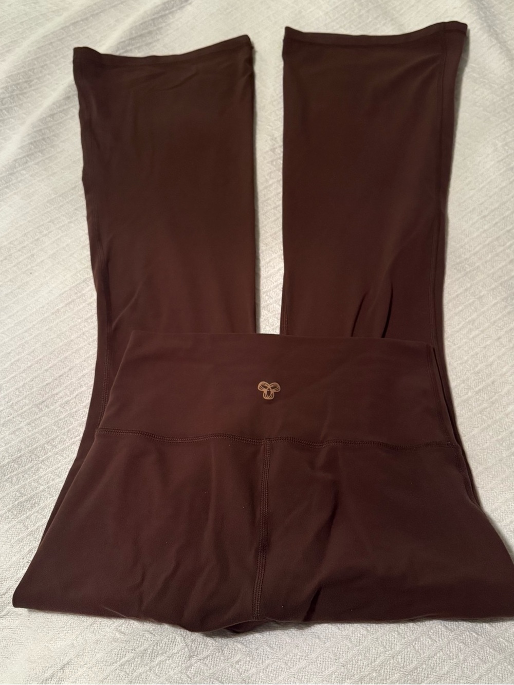 Aritzia TNA Brown flare leggings, size S
